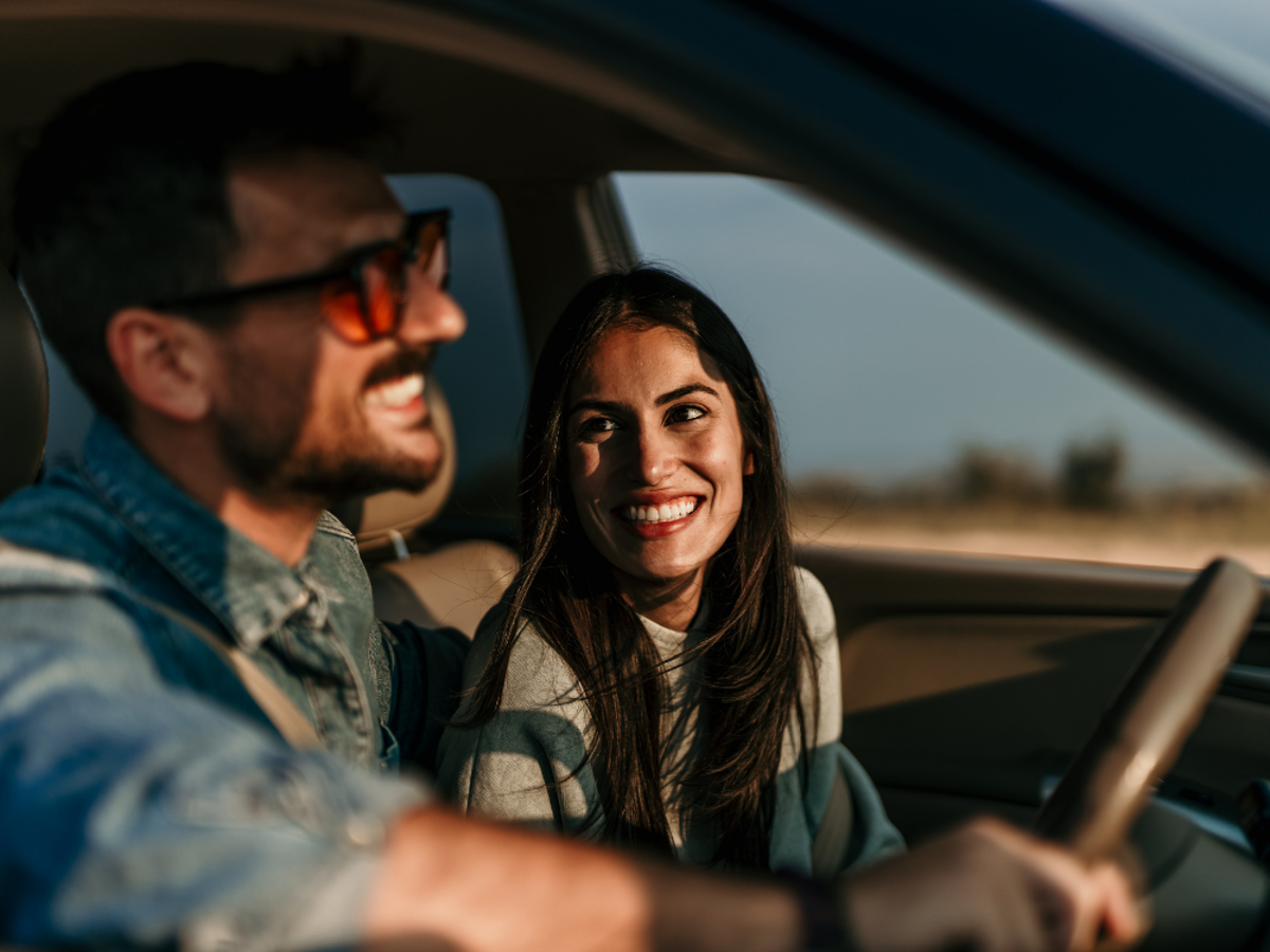 a man and woman in a car