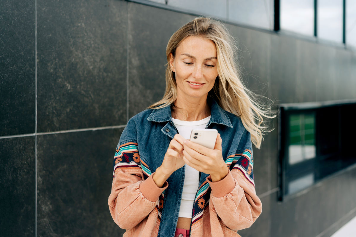 a woman looking at her phone